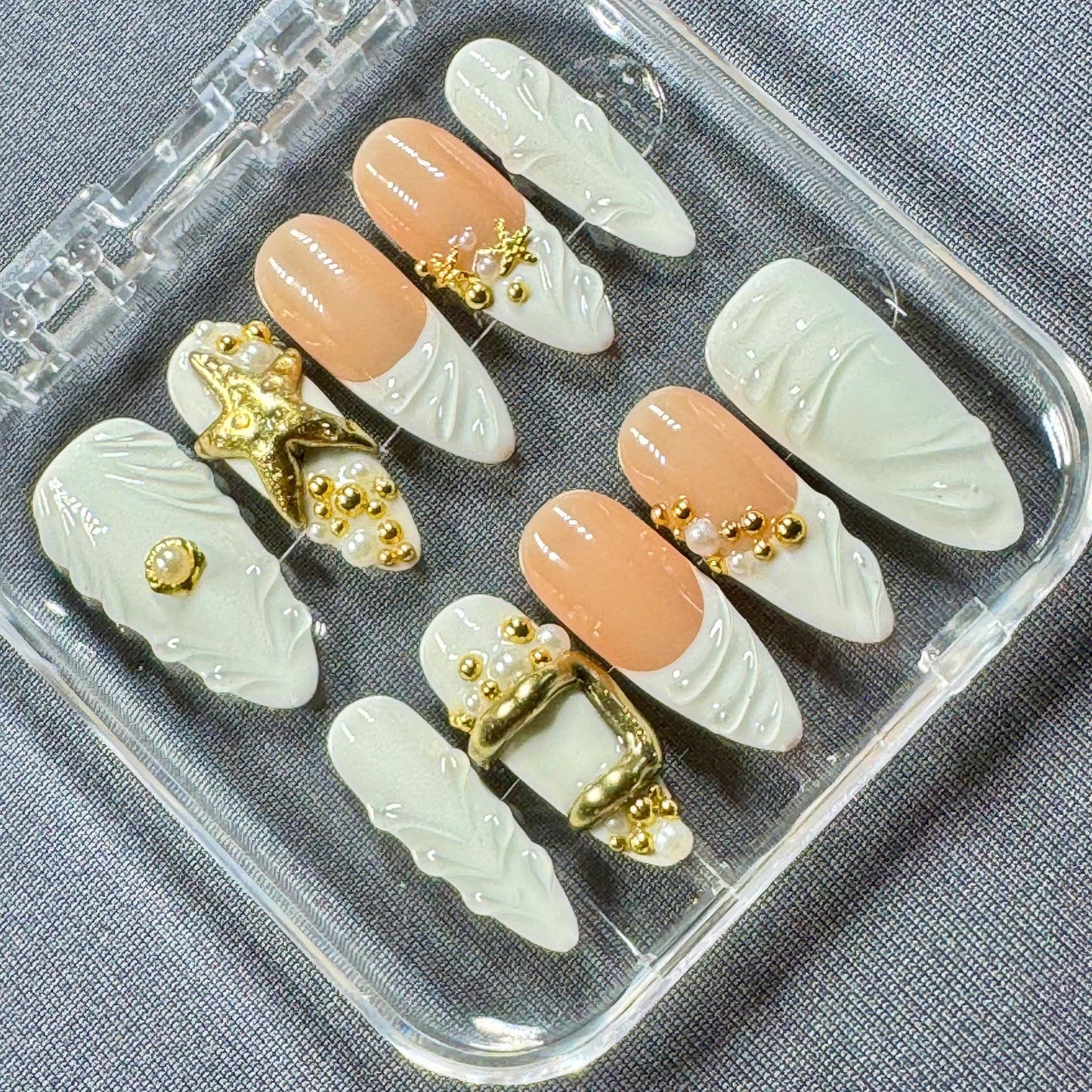 Golden Seashore Press-On Nails – Ivory Sculpted Shell Tips with Gold Starfish Charms Pearl Beads and Nude Base | Summer Ocean Nail Art