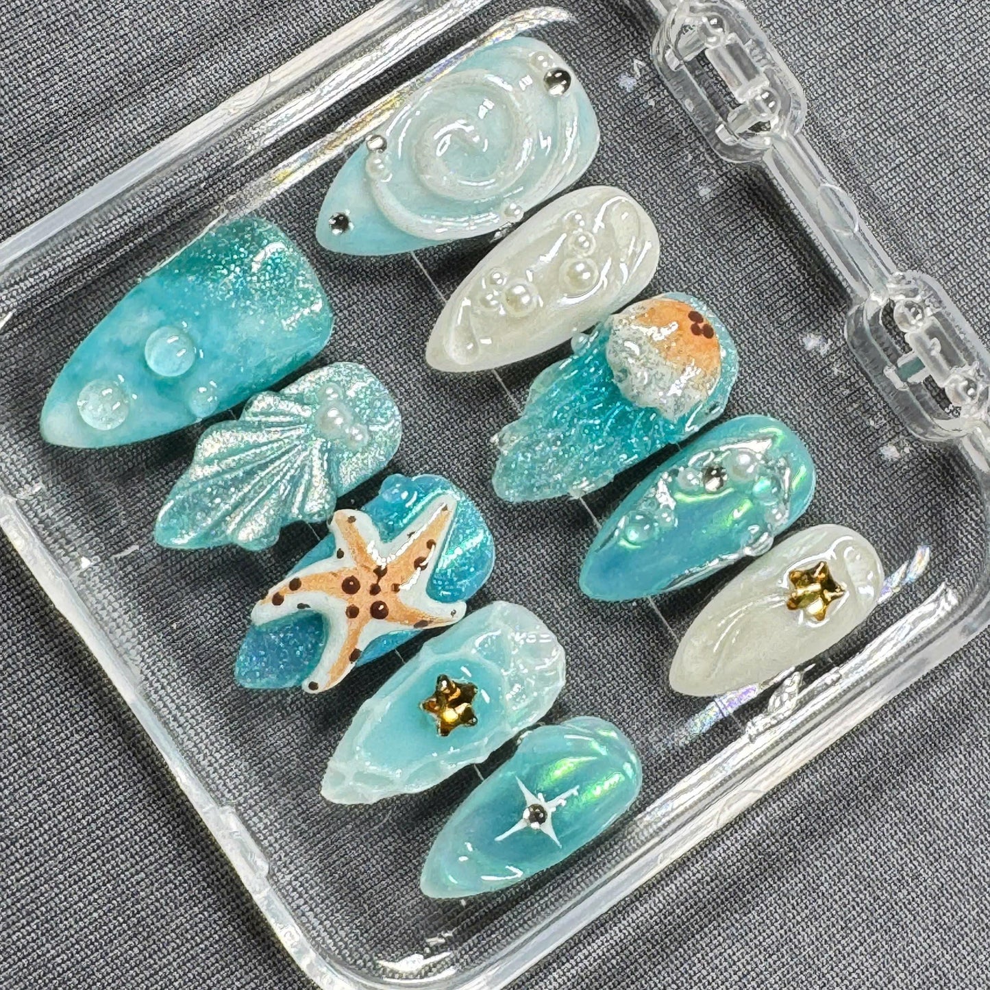 Ocean Fantasy Press On Nails β Starfish, Shells and Jelly Textures in Iridescent Aqua Blue | Gift for Her