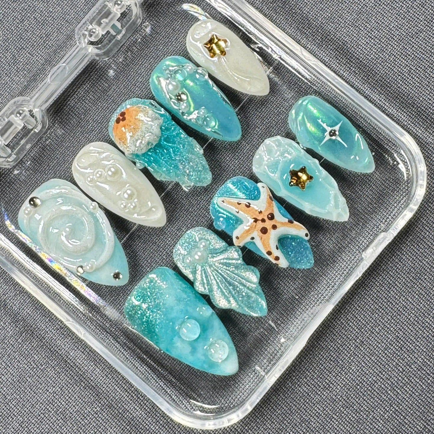 Ocean Fantasy Press On Nails β Starfish, Shells and Jelly Textures in Iridescent Aqua Blue | Gift for Her