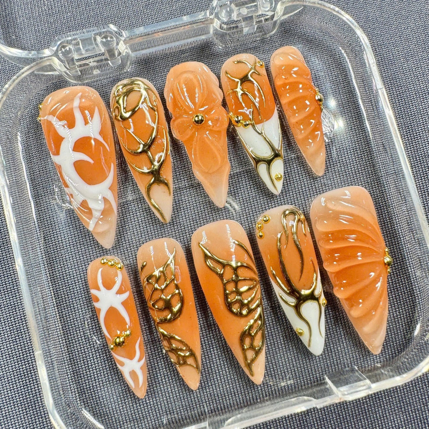 Golden Ember Press-On Nails – Orange Glossy Finish with 3D Bow, Gold Filigree & Sculpted Accents | Handmade Nails for Fall or Events