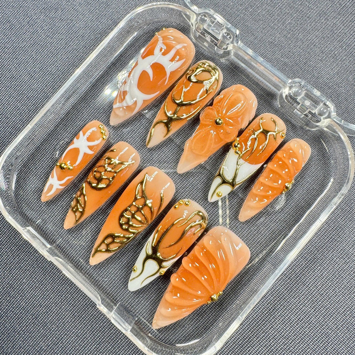 Golden Ember Press-On Nails – Orange Glossy Finish with 3D Bow, Gold Filigree & Sculpted Accents | Handmade Nails for Fall or Events