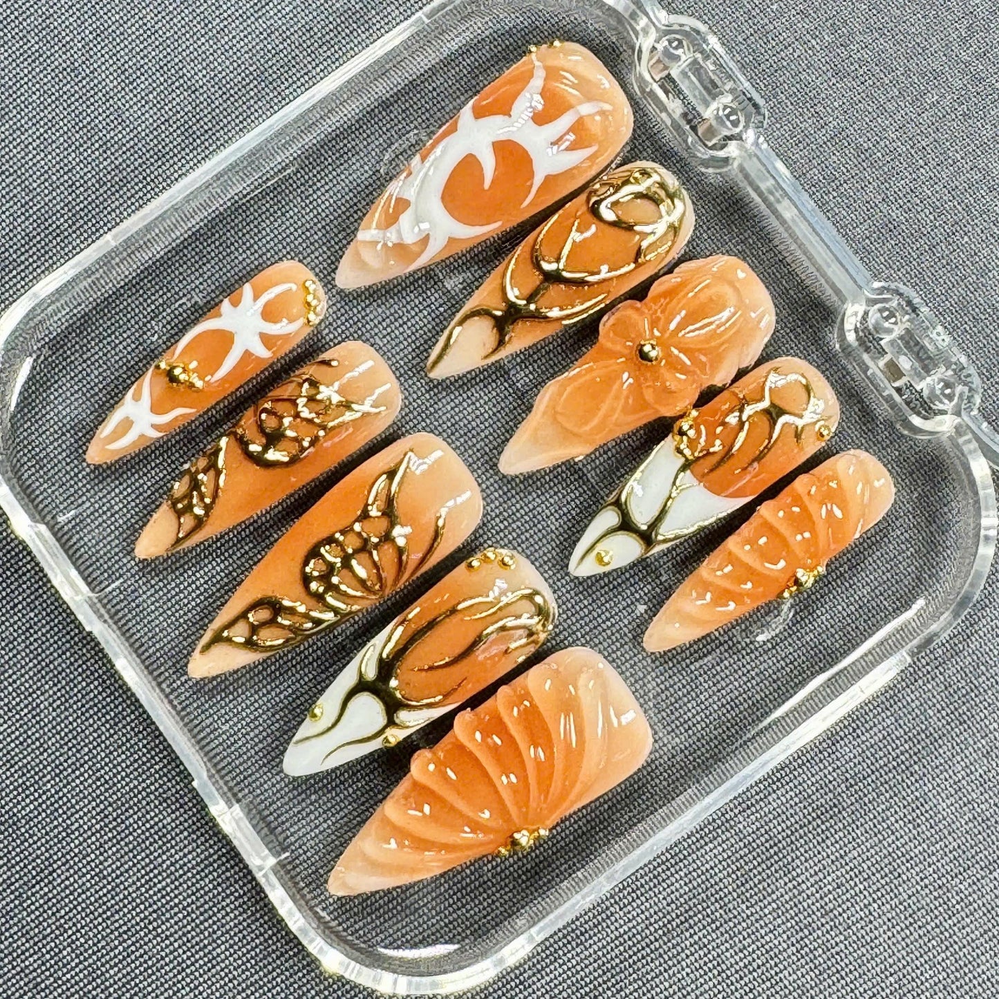Golden Ember Press-On Nails – Orange Glossy Finish with 3D Bow, Gold Filigree & Sculpted Accents | Handmade Nails for Fall or Events